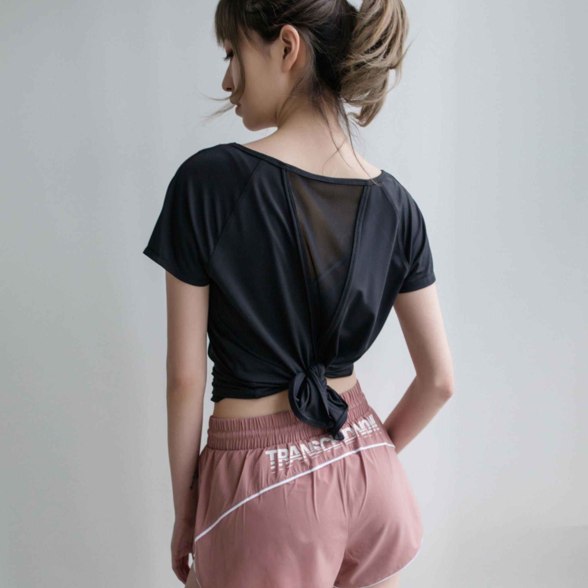バックシースルートライアングル Tシャツ